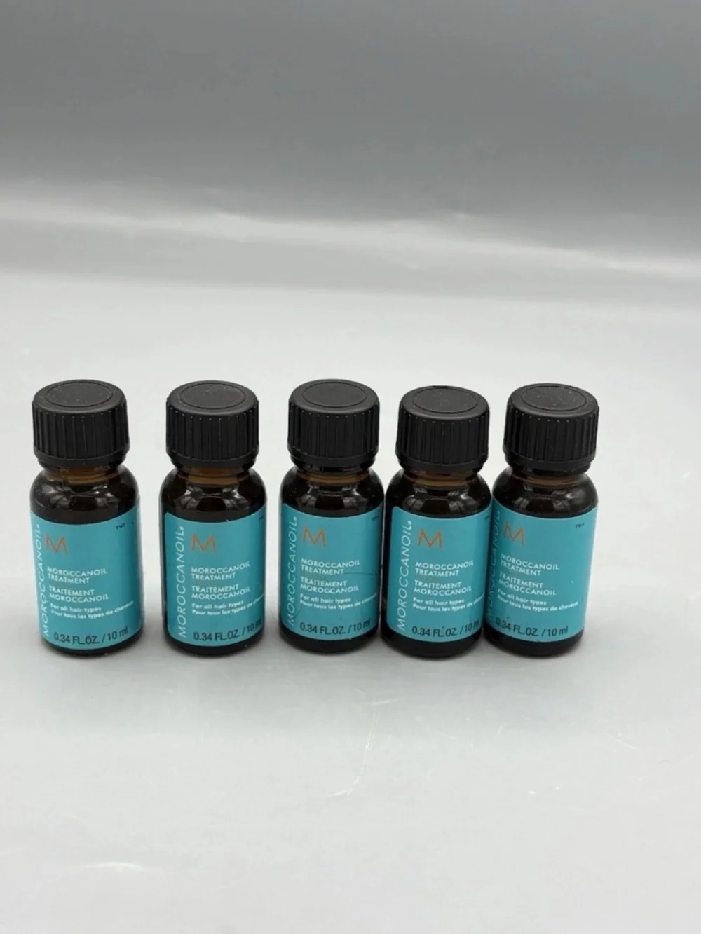 Lot 5 - New Moroccanoil Treatment Original Oil Moroccan Oil Travel .34oz Each